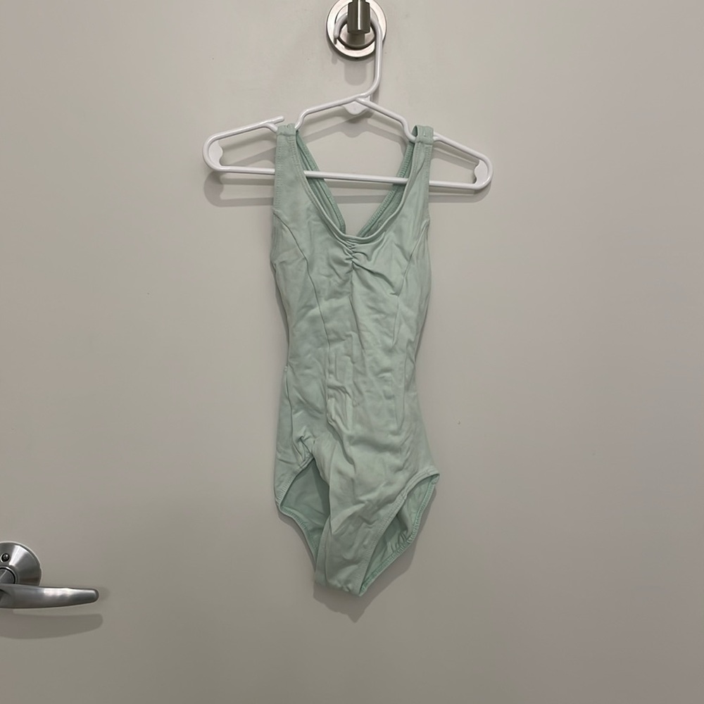 Beautiful mint color leotard, worn once for pictures, size 6x/7